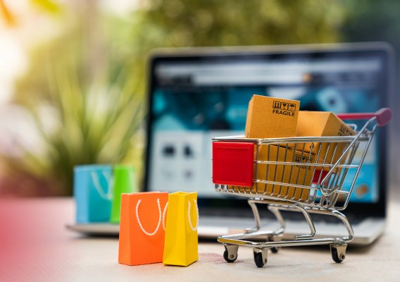 Online storefront on a laptop with a shopping cart