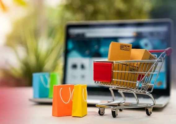 Online storefront on a laptop with a shopping cart